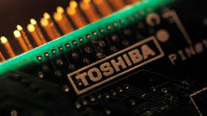 Media Reports Say Bidding In Toshiba Chip Unit Being Mulled Jointly By Japan Government Fund, Bank And Broadcom