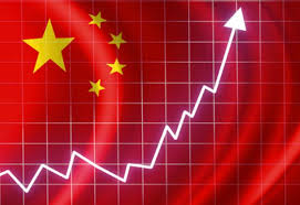 Moody's Raises Global Outlook, China Factories Hum In Shadow Of Debt Risk