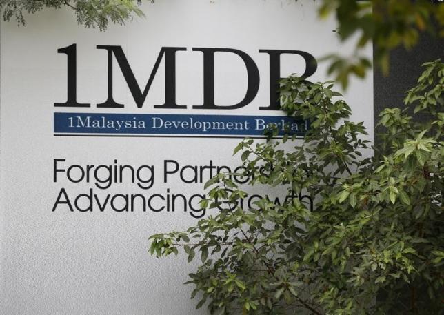 Justice Department subpoenas former Goldman Sachs banker in connection with 1MDB investigation