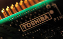 Media Reports Say Bidding In Toshiba Chip Unit Being Mulled Jointly By Japan Government Fund, Bank And Broadcom