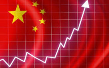 Moody's Raises Global Outlook, China Factories Hum In Shadow Of Debt Risk