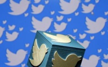 Twitter hands out stock and cash to retain its employees